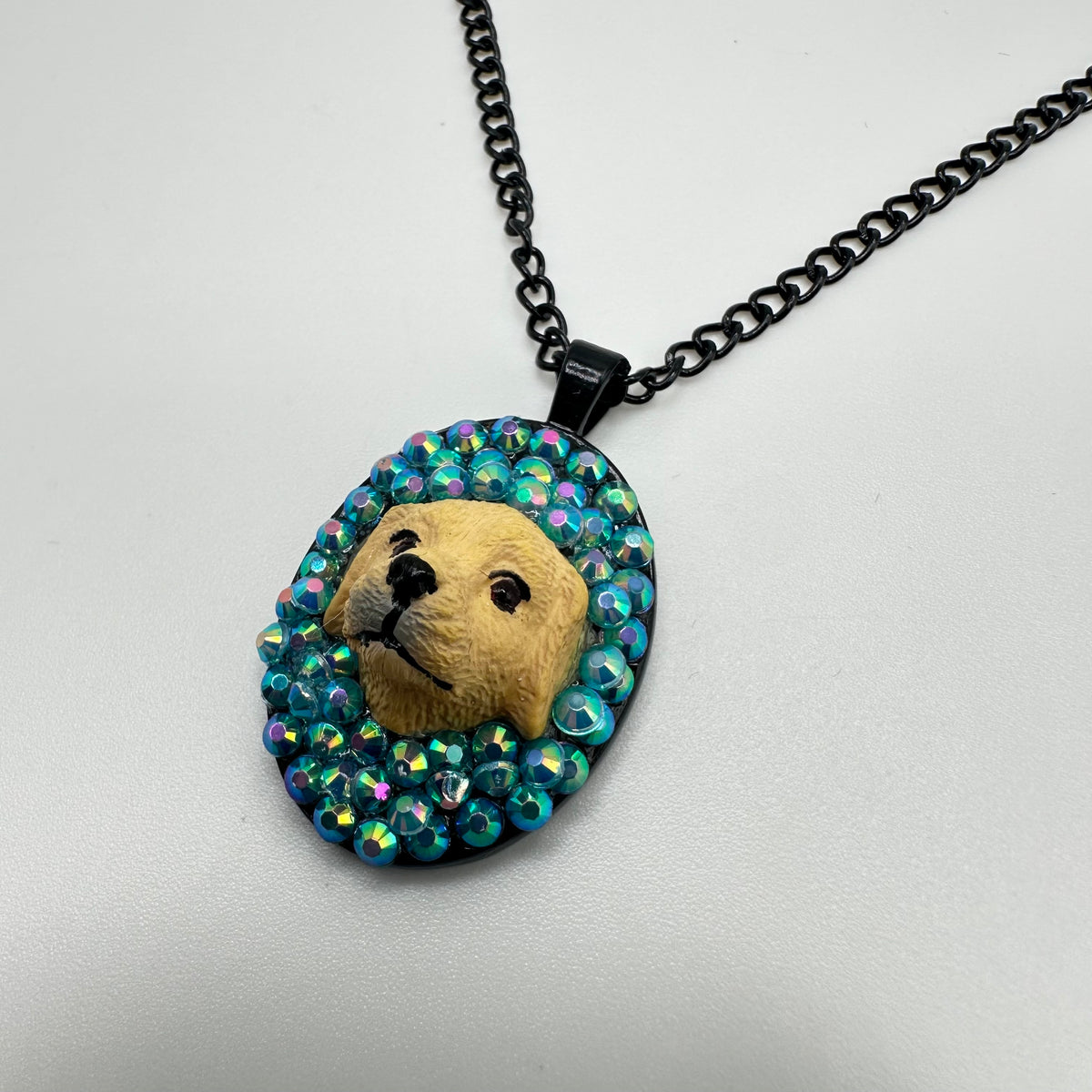 Golden Pup in Blue Iridescence Necklace